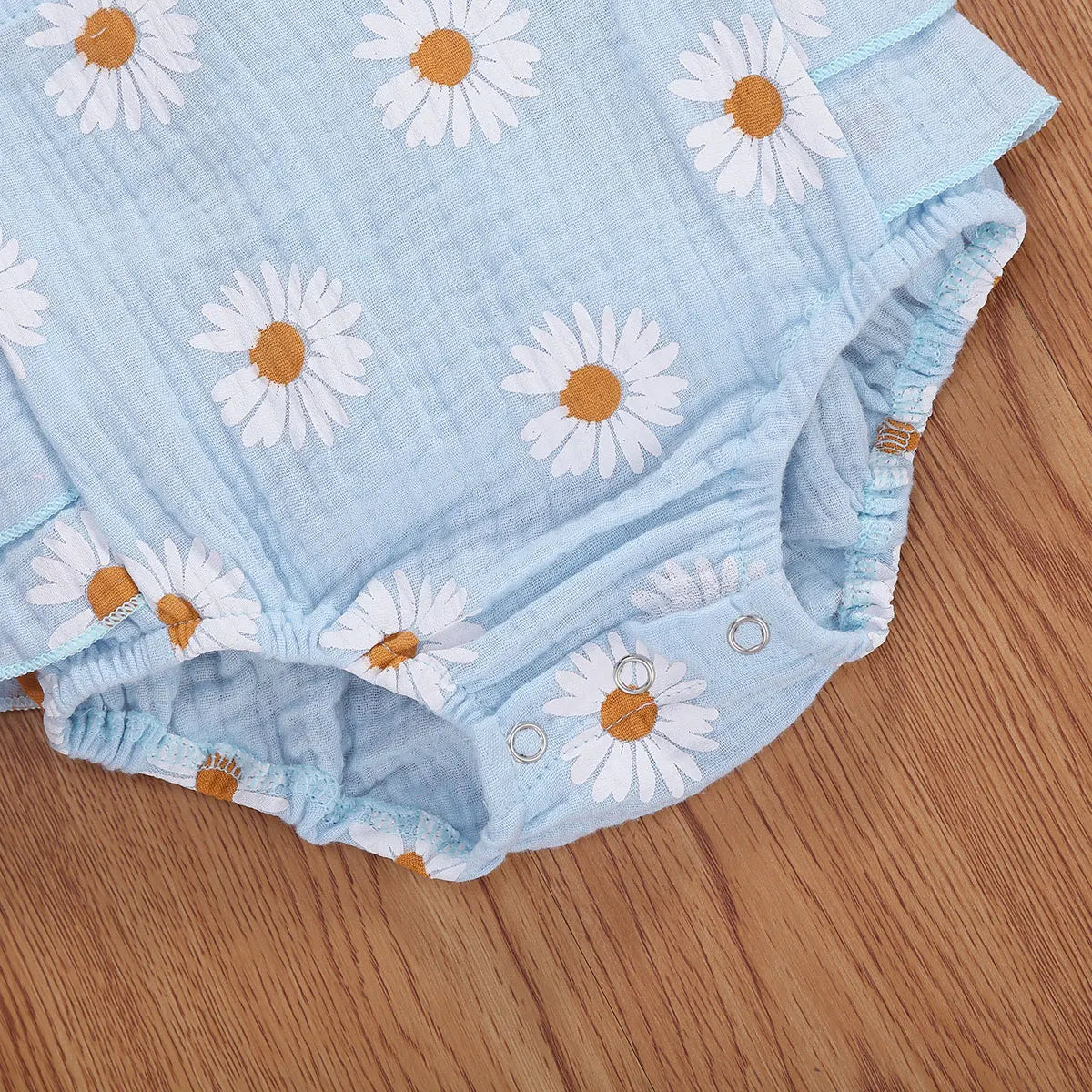 Barboteuse mignonne motif marguerites