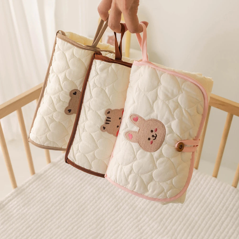 Matelas à langer pliable et portable